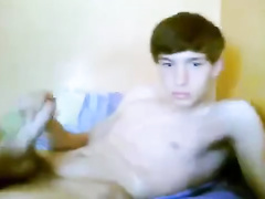 Cutie twink is jerking off his dick on couch