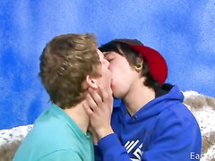 Naughty teen boyfriend are excitingly kissing on couch