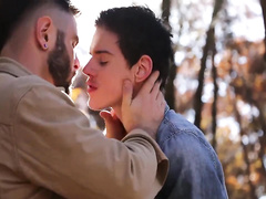 Bearded hunk with sexy strong muscles enjoys fucking teen twink in woods